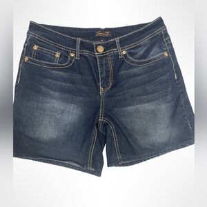 Seven woman’s denim dark wash shorts. Size 10.‎